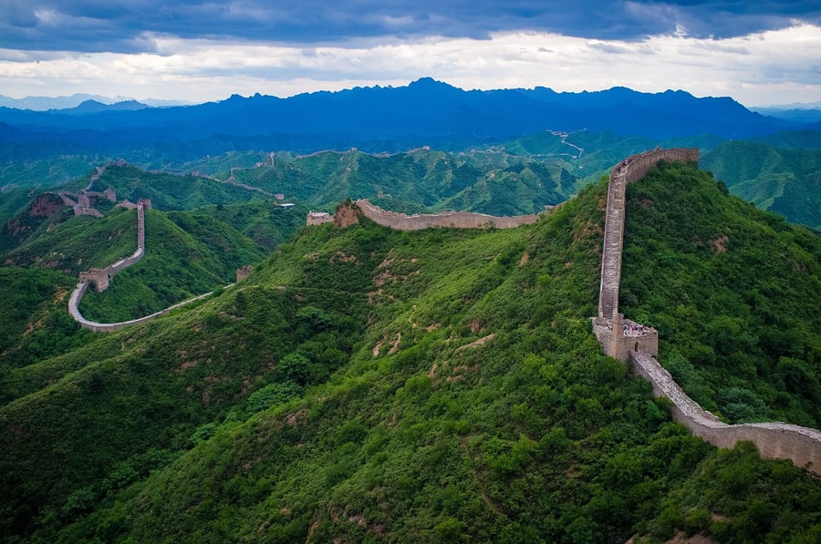 The Great Wall winding over green ridges at Jinshanling