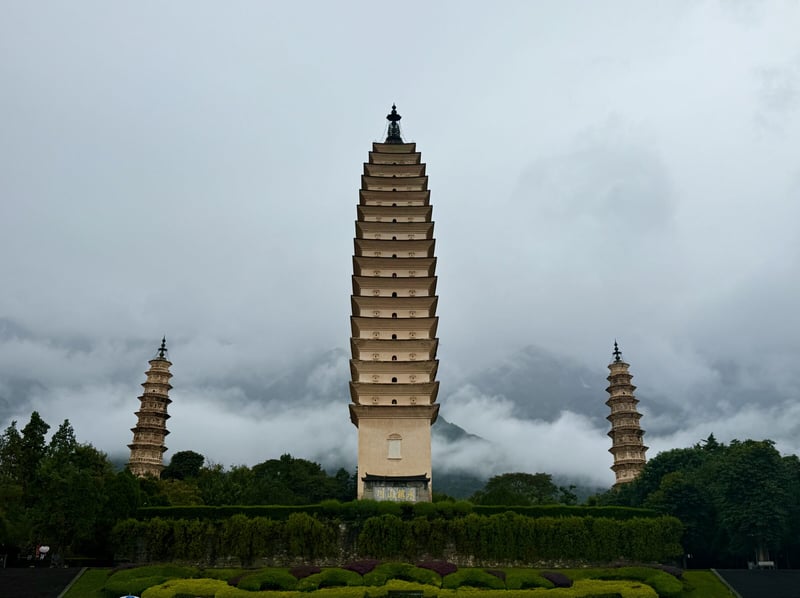 The Three Pagodas of Dali with mountains and cloud behind
