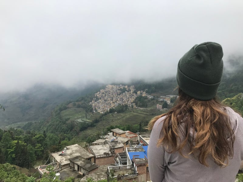 Clouds lifting over a Hani village on the Yuanyang rice terraces